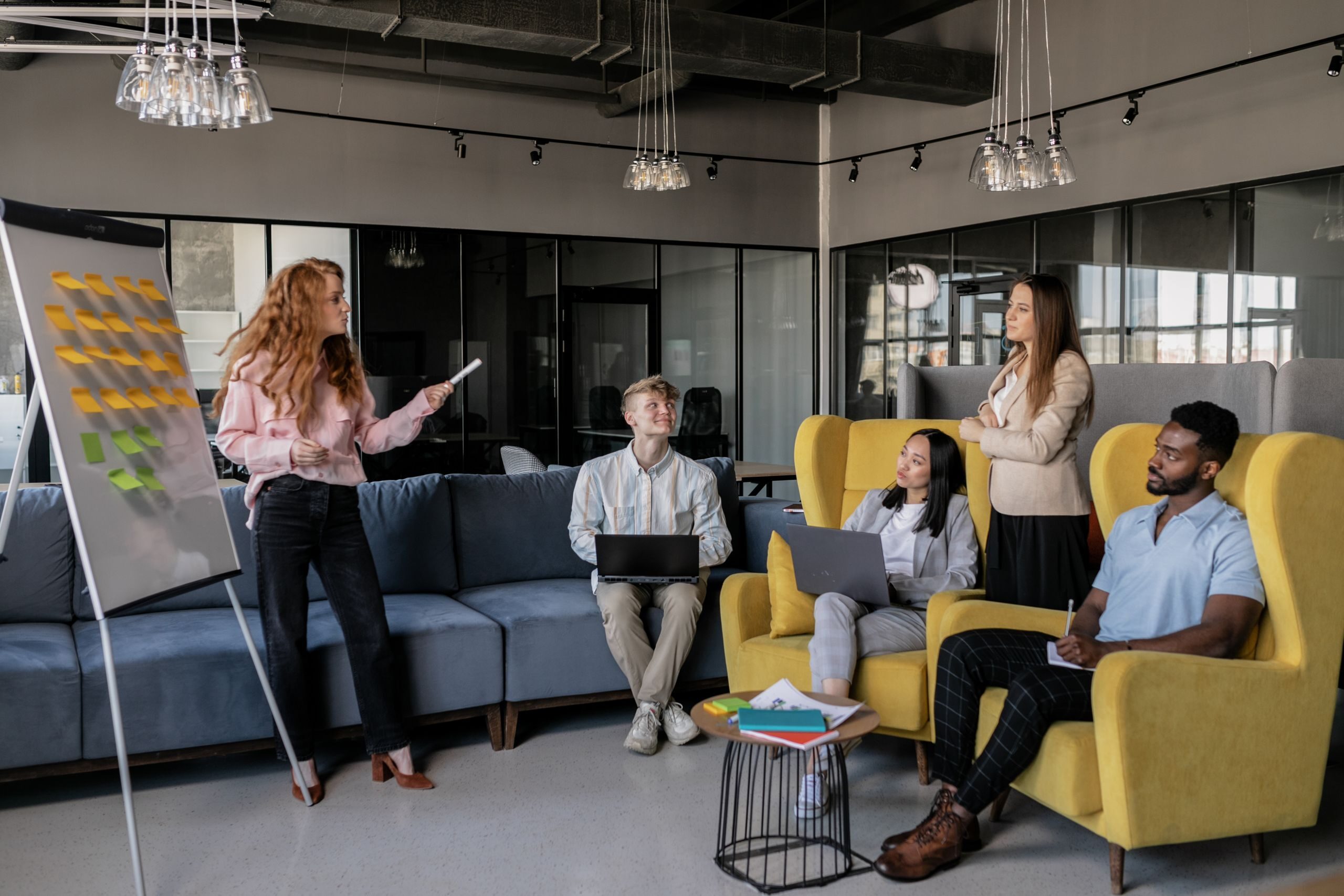 Professional team conducting a brainstorming session in a modern office setting.